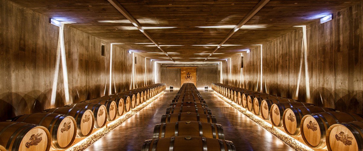 Barrels in the cellar at Marqués de Murrieta Castillo de Ygay